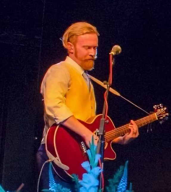 Alasdair Ross playing guitar